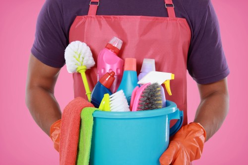 Carpet cleaning technician preparing equipment for service booking